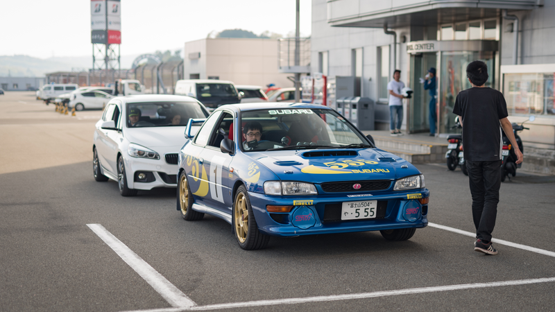Lining up for the ‘My Car Parade’. Bonus points for the number plate